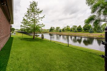 Pond with green landscape